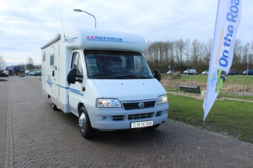 Adria Coral 660 SL 2.8 JTD 128 PK Half-integraal, Enkele-bedden, Draaistoelen, Halve-treinzit, Zij-bank, Garage, 5 Zitplaatsen op het kenteken, Bj.2005